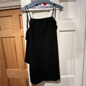 Lulus black dress with bow in the back. Tags are not on but never worn.
